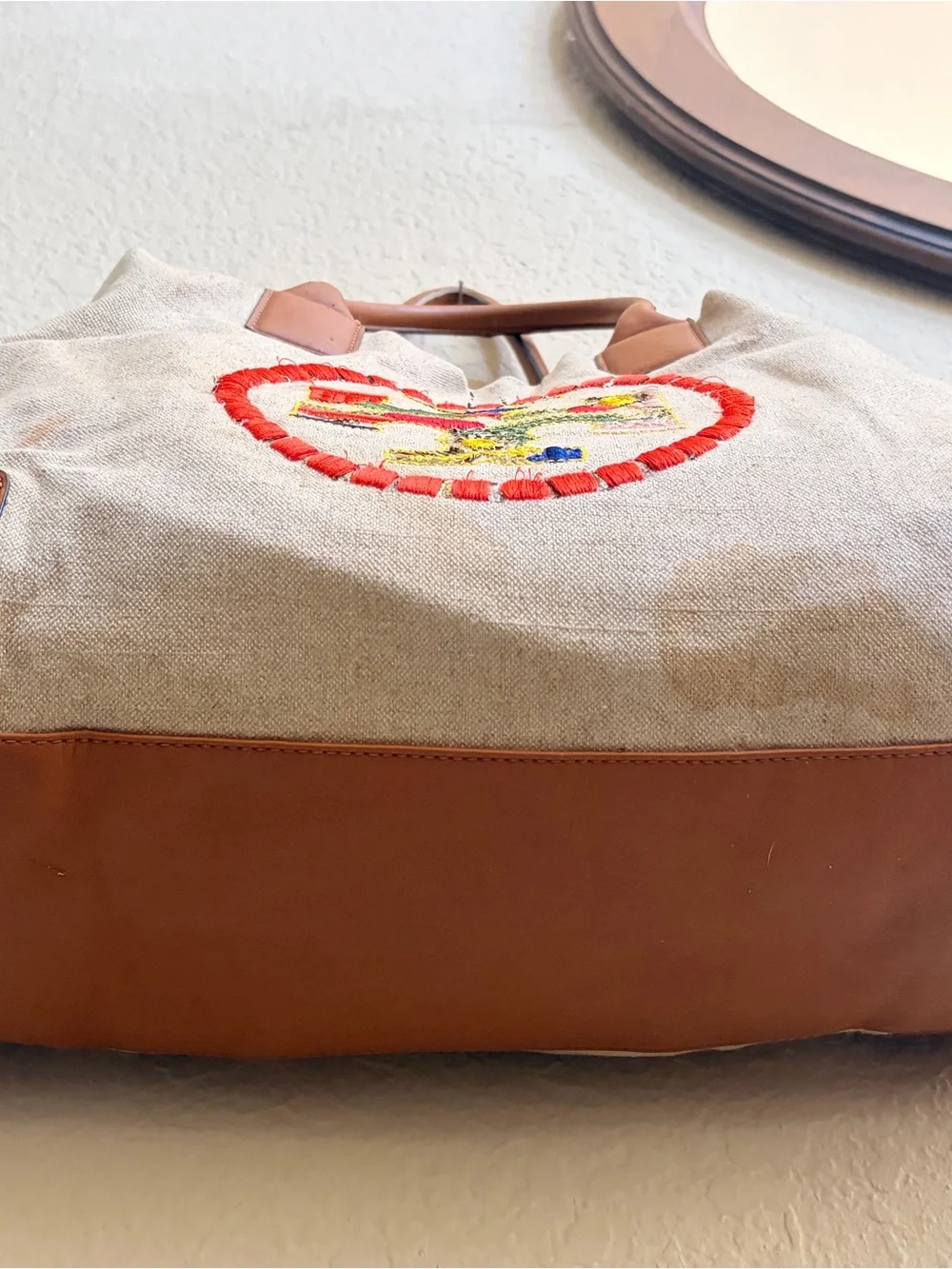 Tory Burch Beige Canvas Tote with Brown Leather Trim and Embroidered Medallion